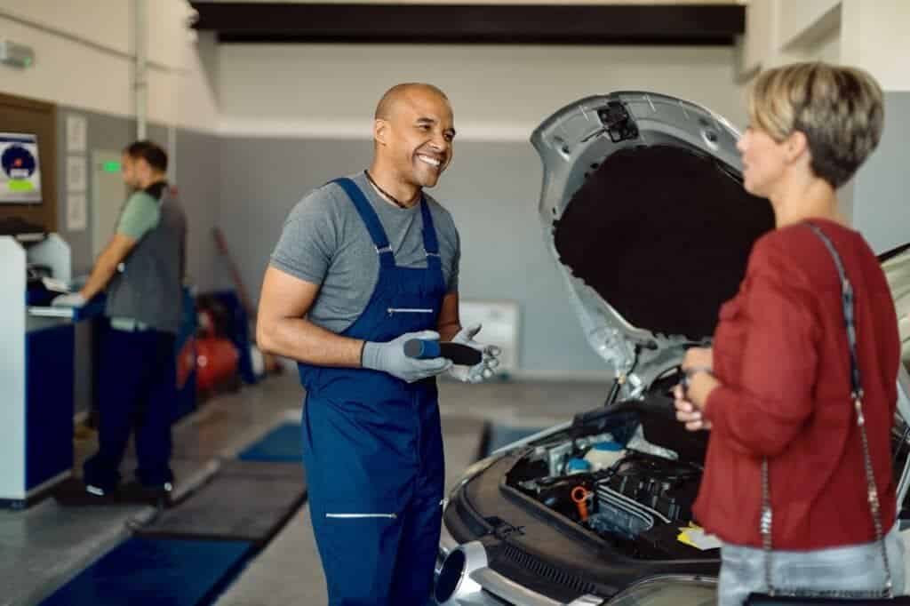 A happy mechanic and a satisfied customer