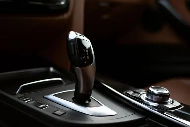 a closeup of a modern car's gear shifter.